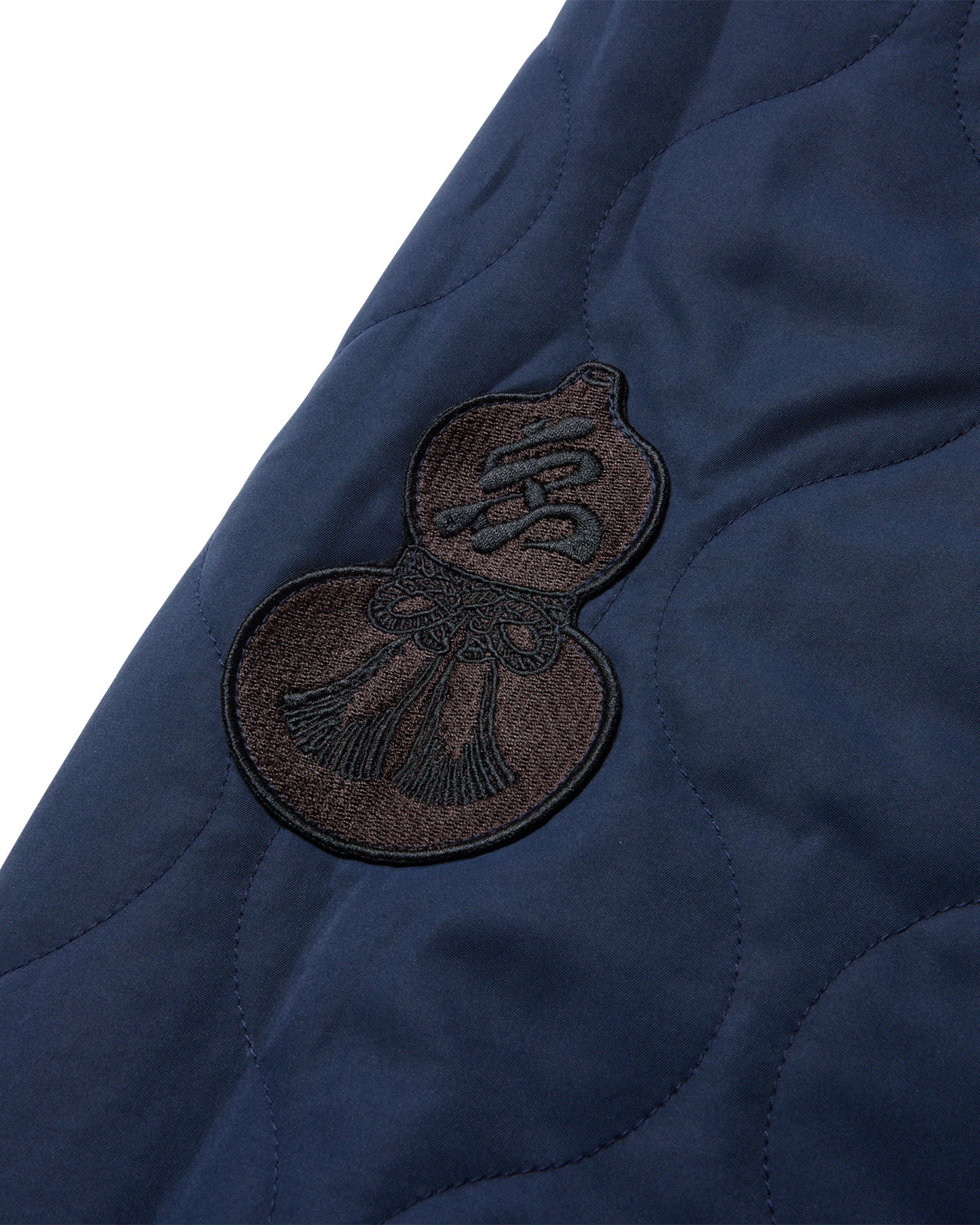 REVERSIBLE SOUVENIR QUILTED JKT - NAVY