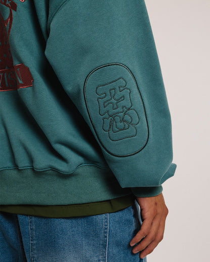 TIGER MATCH EMBLEM CREW SWEAT