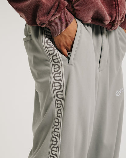 E LOGO TRACK PANTS - GREY