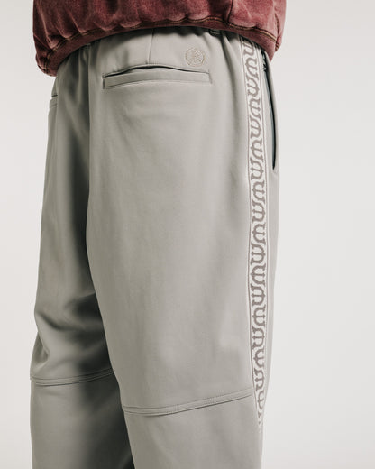 E LOGO TRACK PANTS - GREY